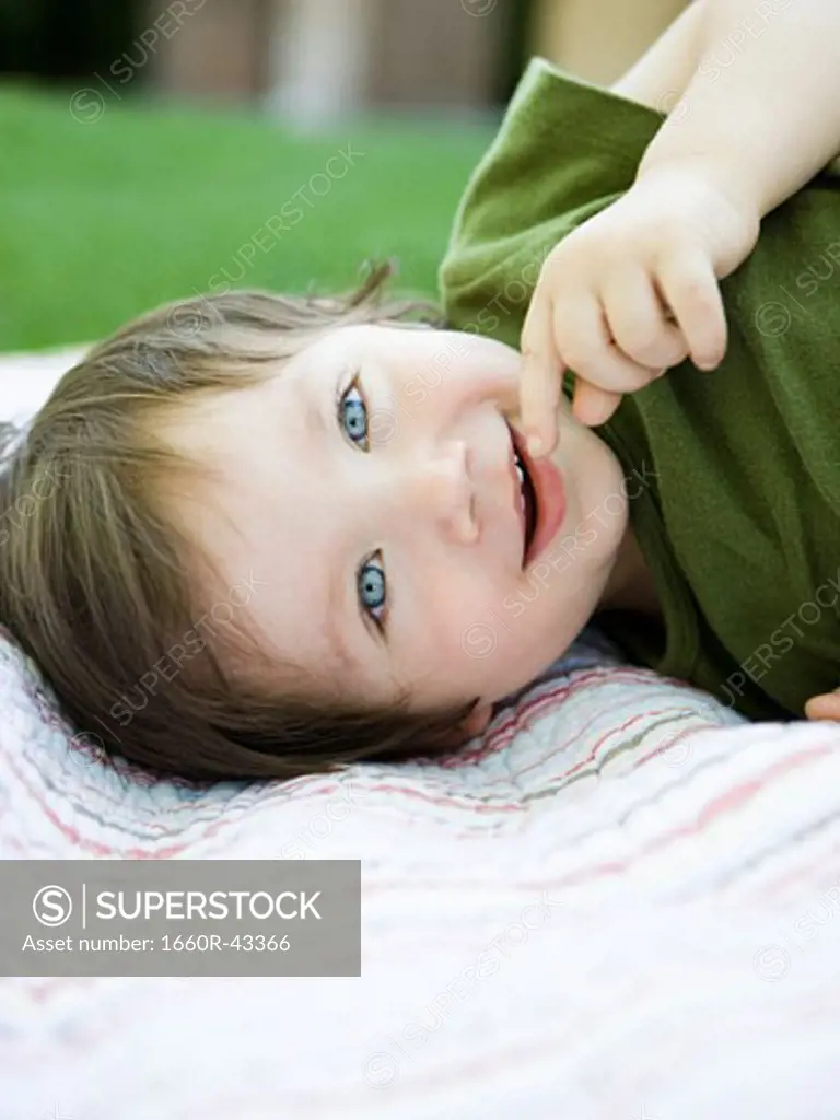 little boy in a green shirt