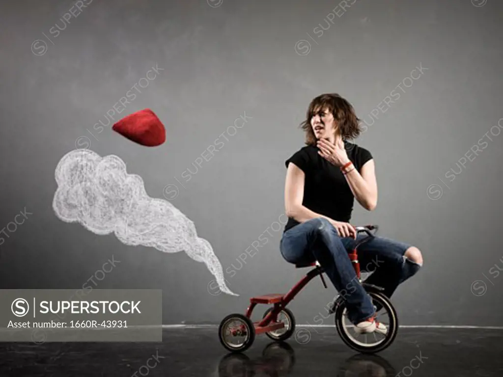 woman on a tricycle