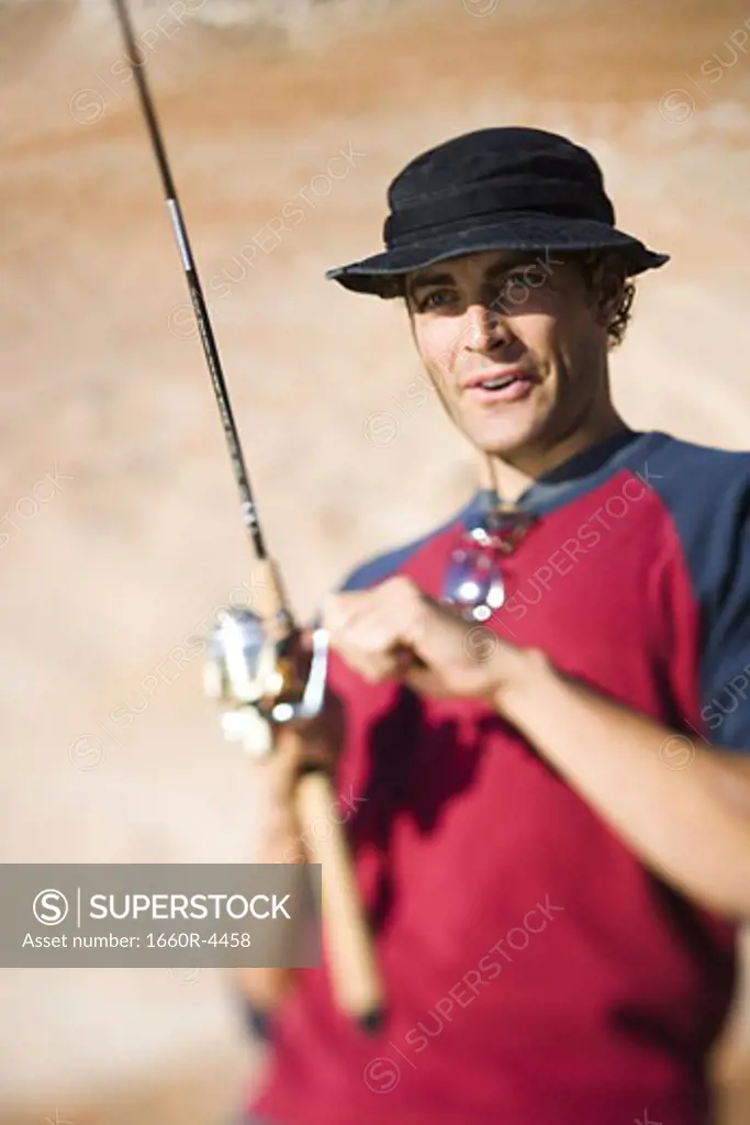 Close-up of a young man fishing