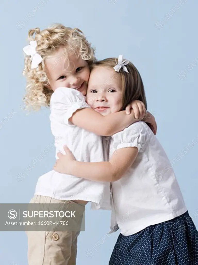 two little girls hugging