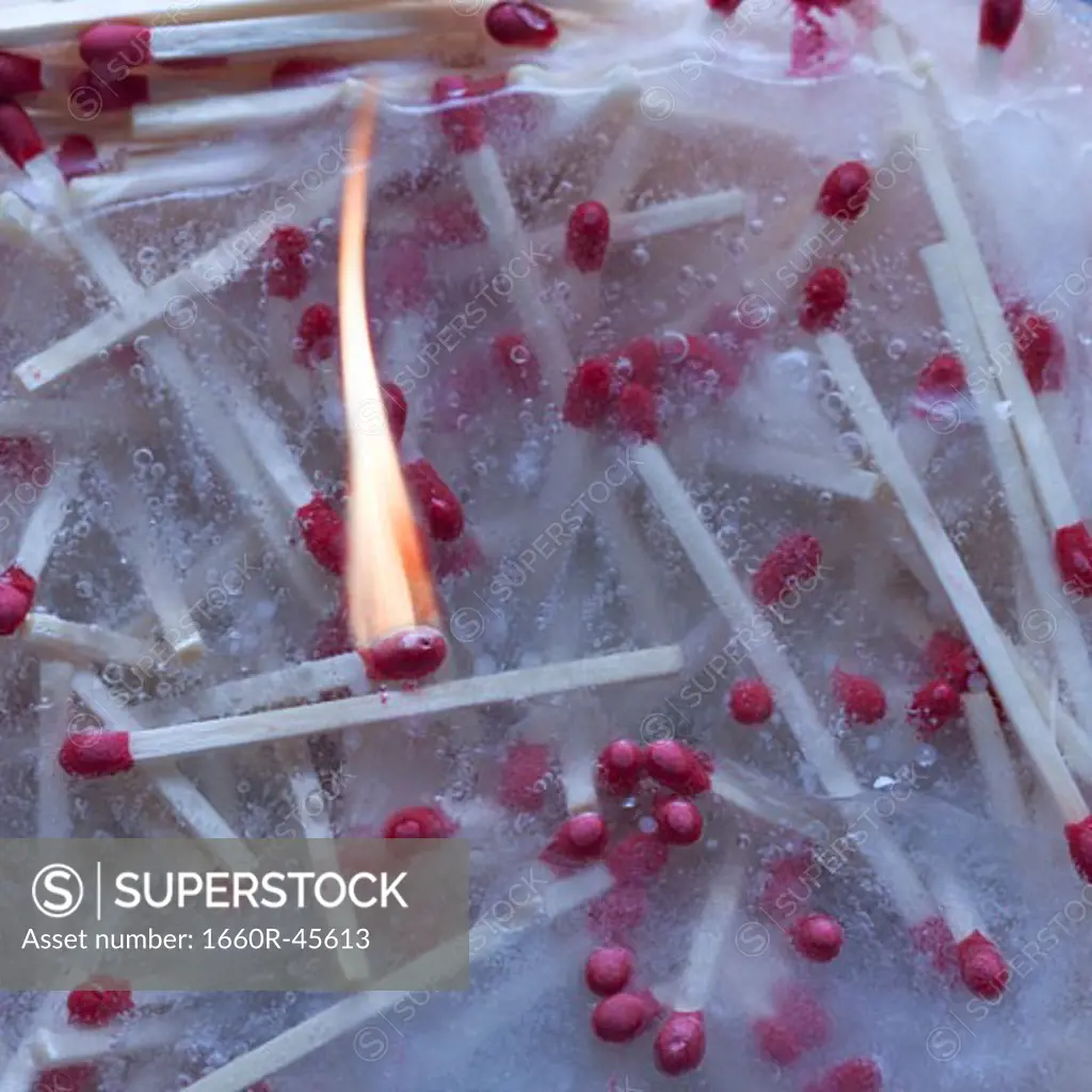 matches frozen in a block of ice