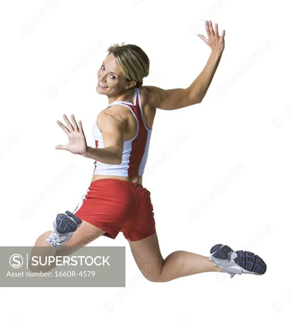 Rear view of a young woman exercising