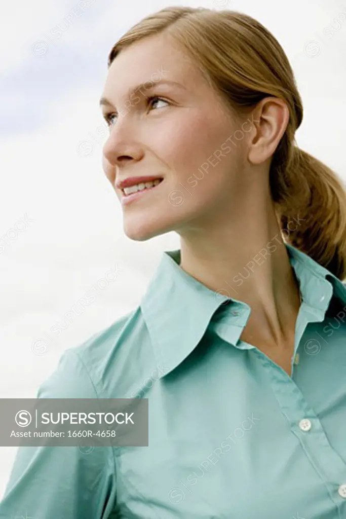 Close-up of a young woman looking sideways