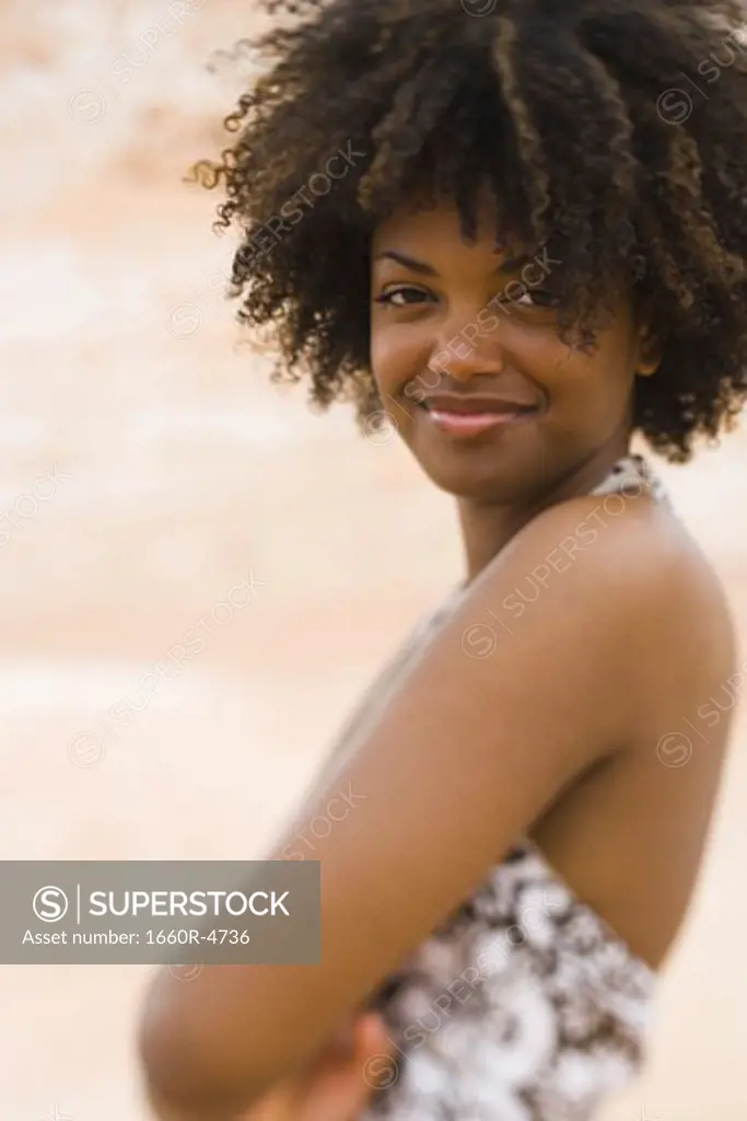 Profile of a young woman smiling