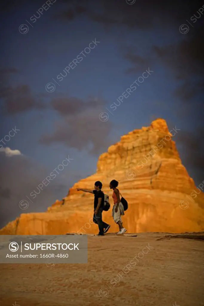 Profile of a young couple walking