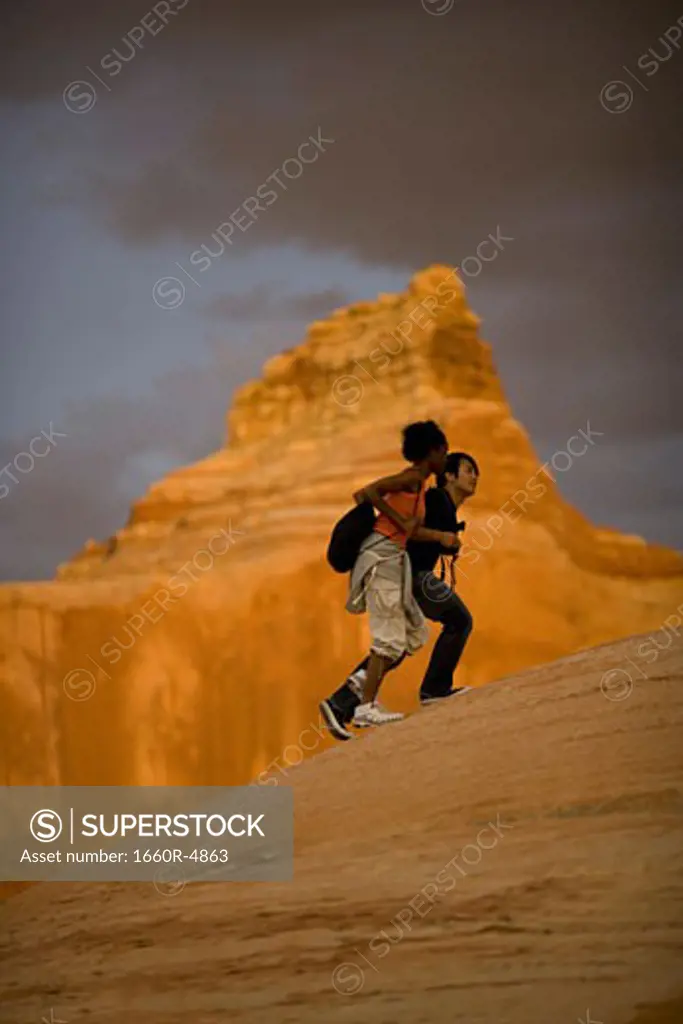 Profile of a young couple walking