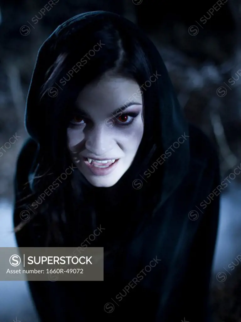 USA, Utah, Cedar Hills, Portrait of female teenage vampire (16-17) wearing hood