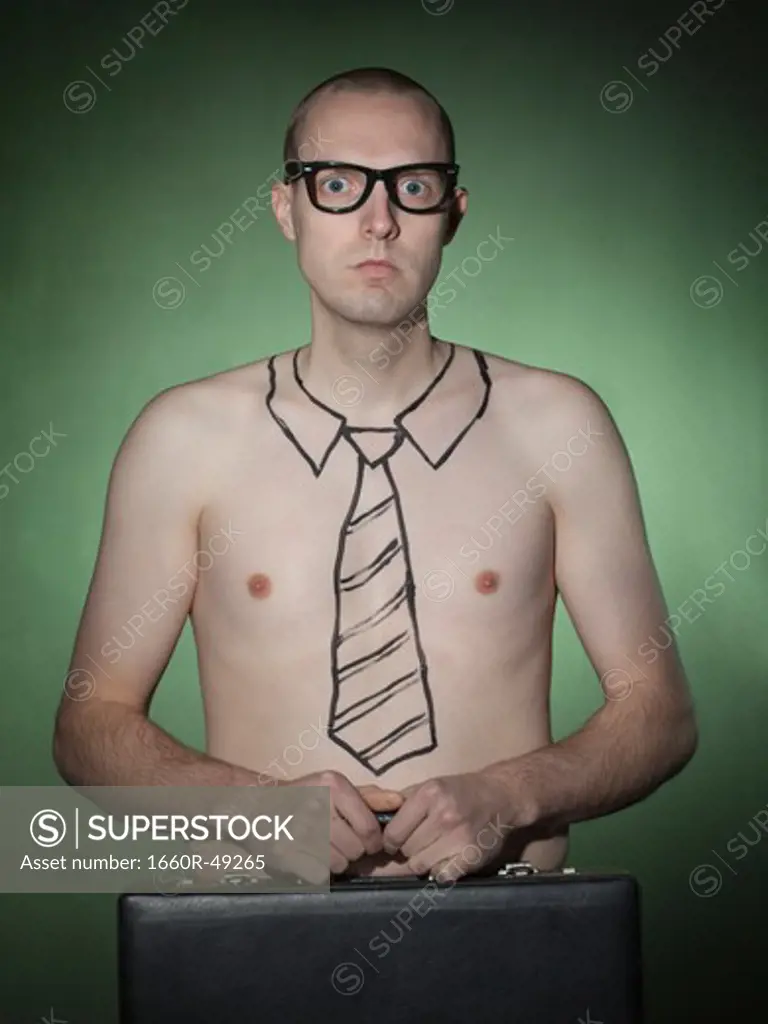 Portrait of young businessman with tie tattoo, holding briefcase