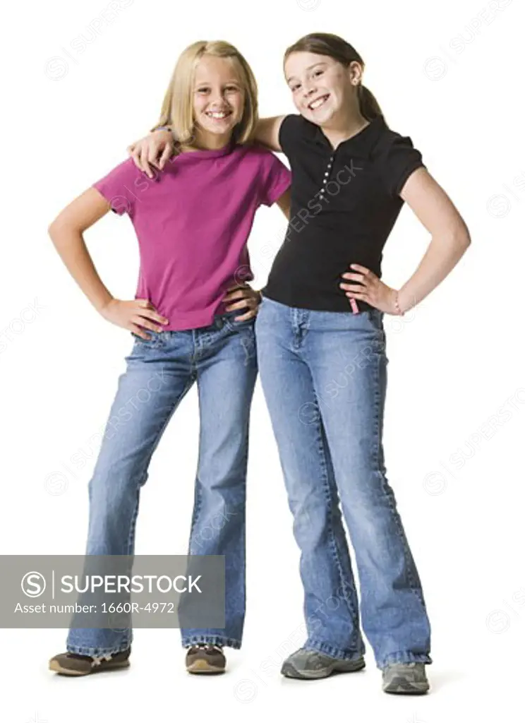 Two young girls standing together
