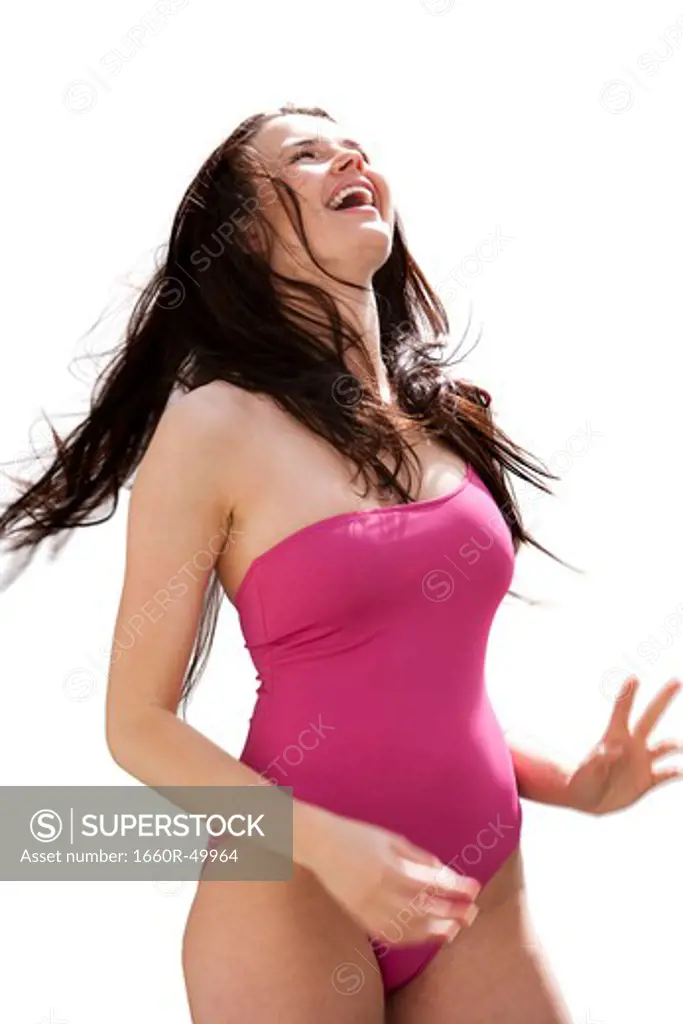 Woman in swimsuit laughing