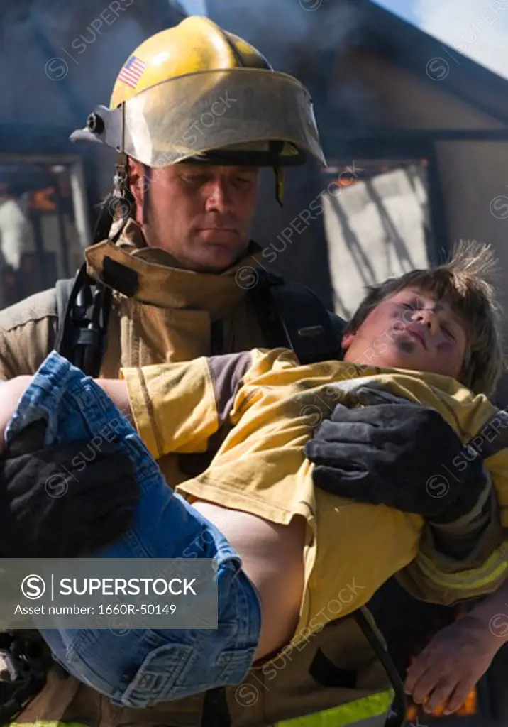 Fire fighter rescuing child