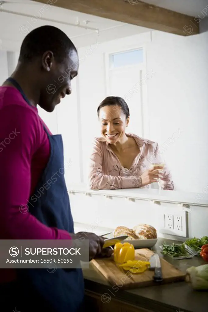 A couple preparing food
