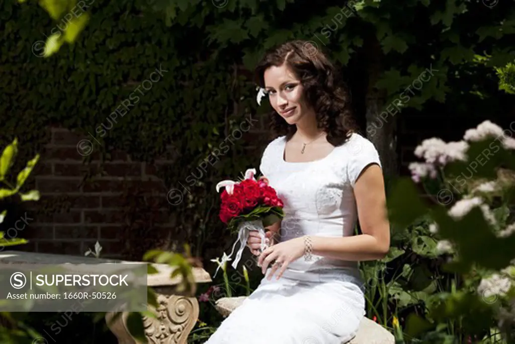 Woman posing in garden