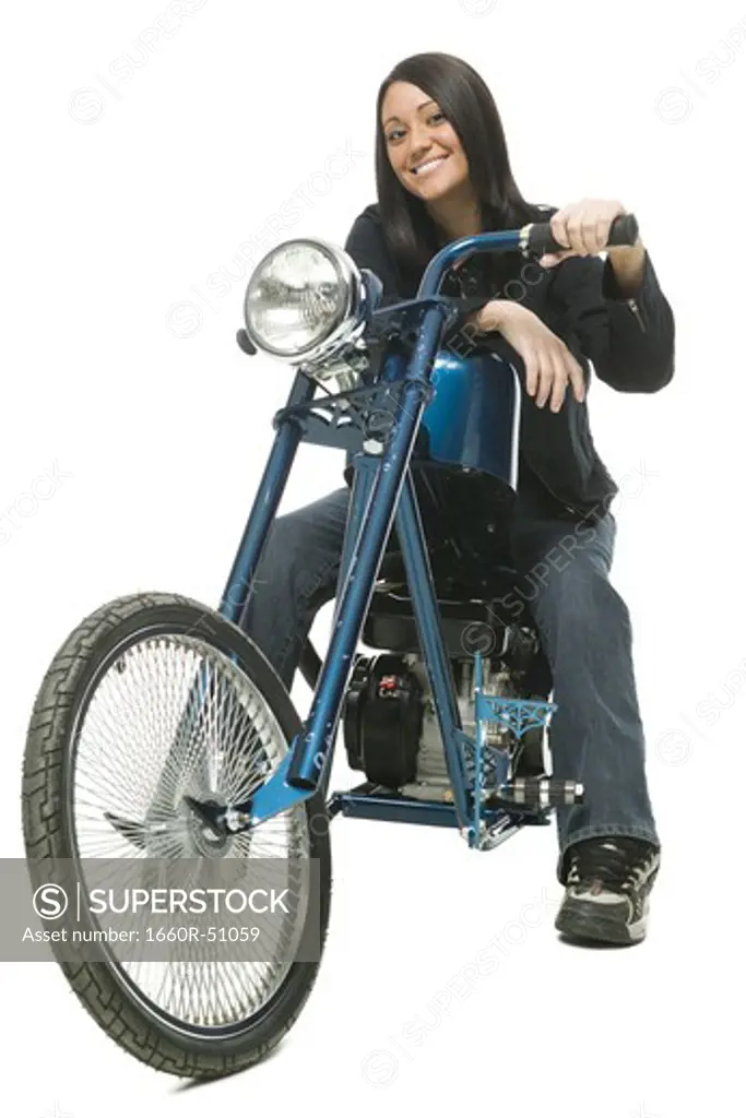 Woman posing on motorcycle