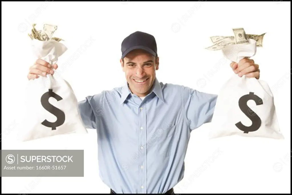 Man holding money bags