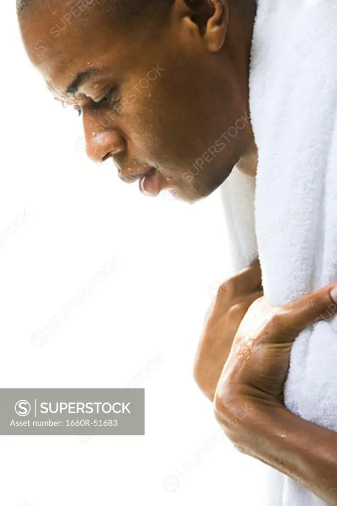 Man sweating with a towel