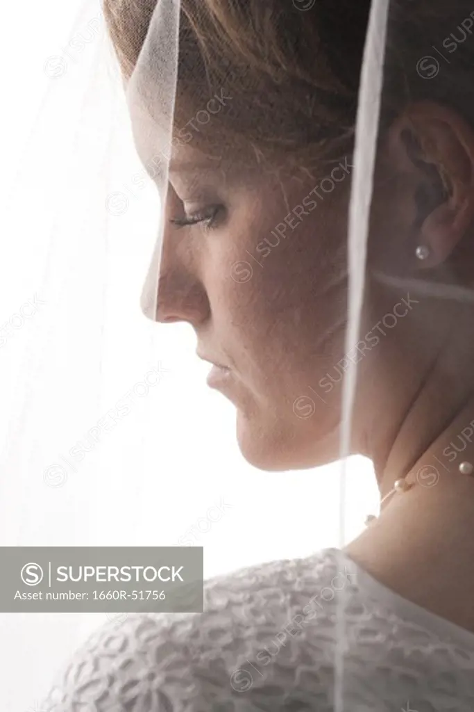 Side profile of bride in veil