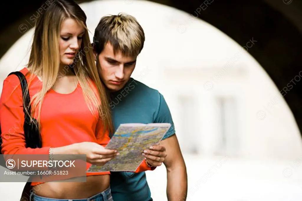 Couple reading a map