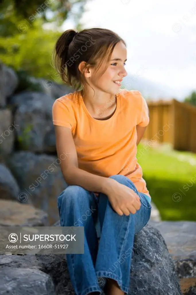 Girl sitting outside