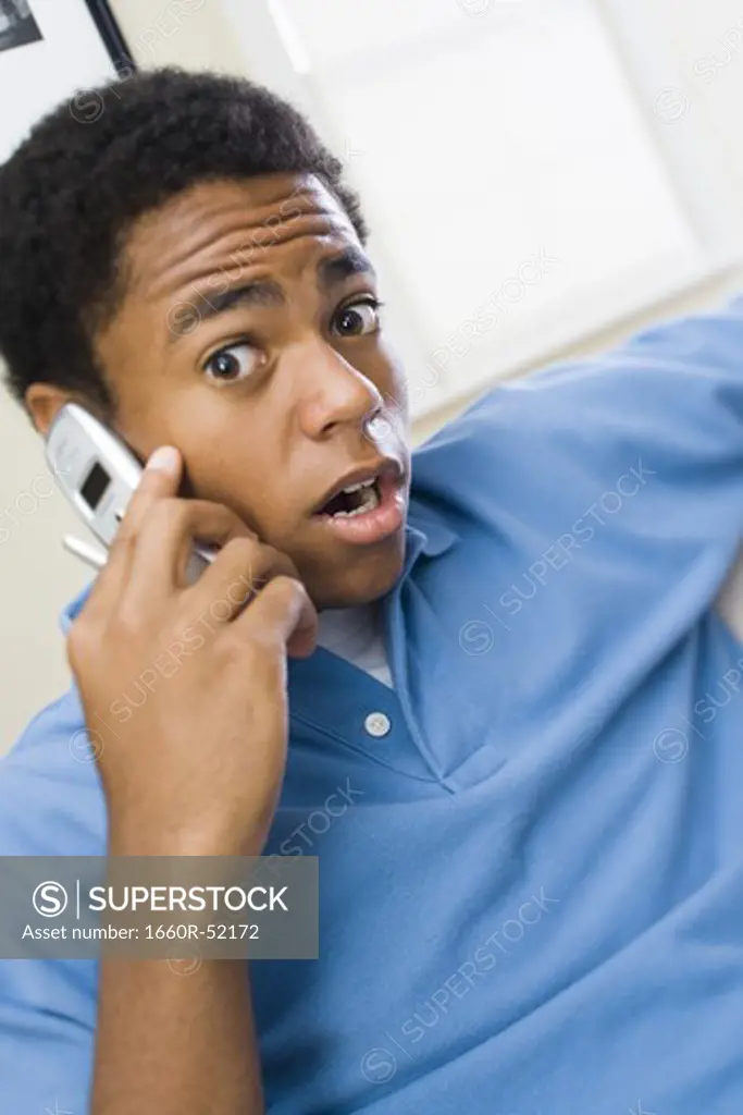 Teenage boy on cellular phone