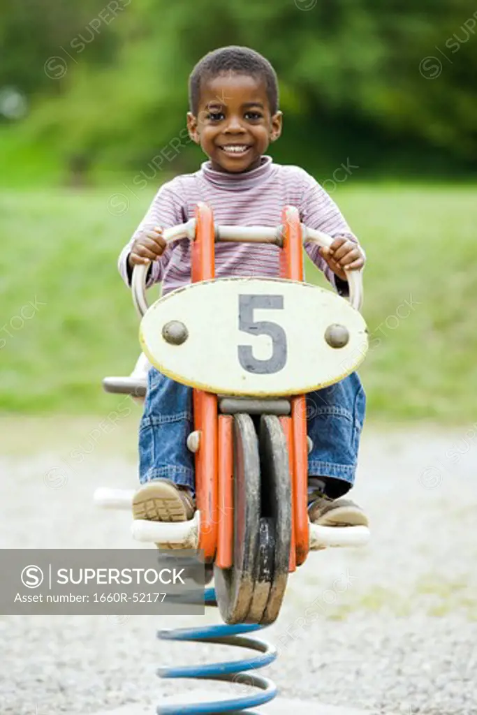 Boy playing in playground