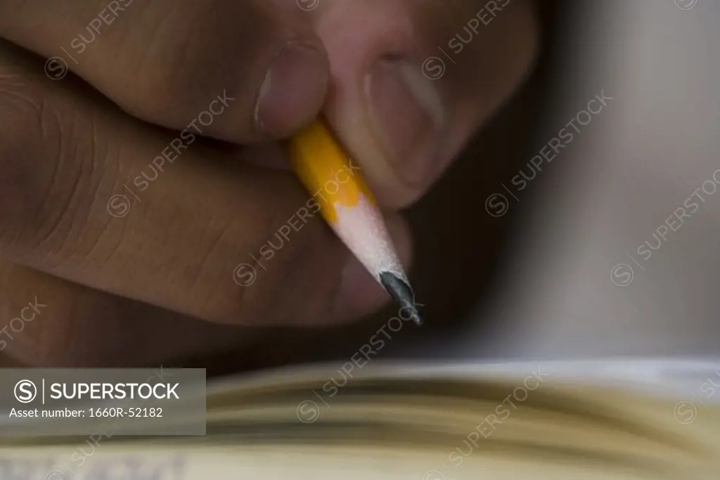 Hand writing with pencil