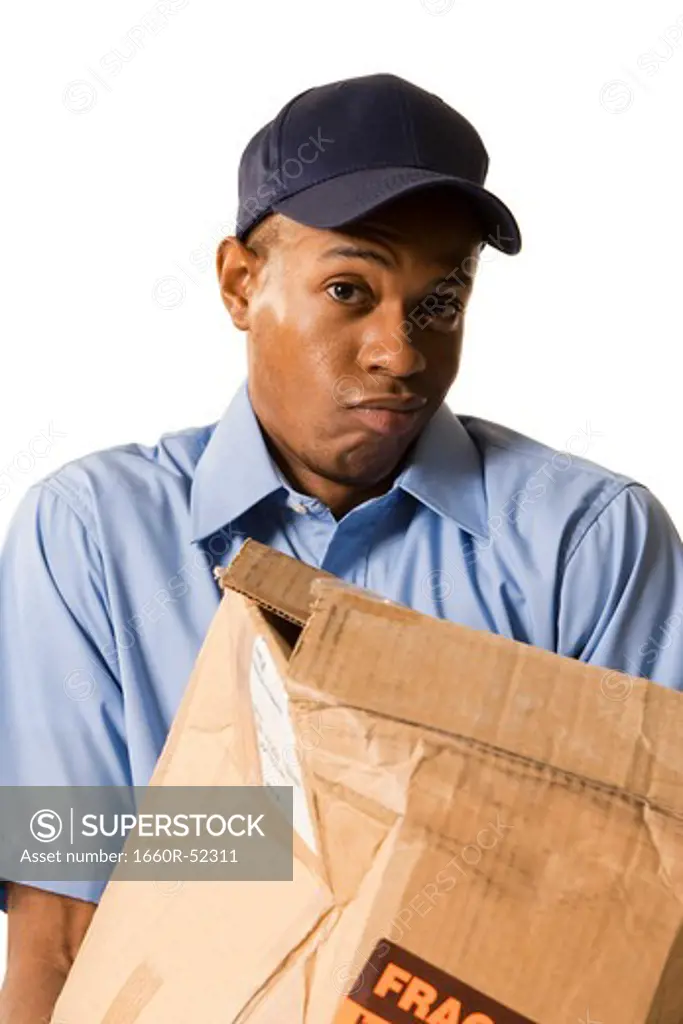 Deliveryman holding a damaged parcel