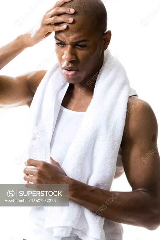 Man with white towel around neck