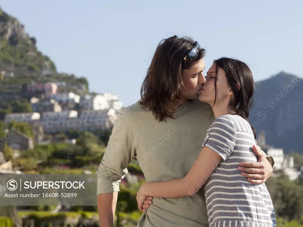 Italy, Ravello, Young couple kissing