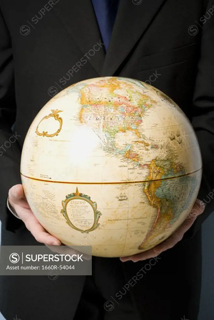 Man holding globe