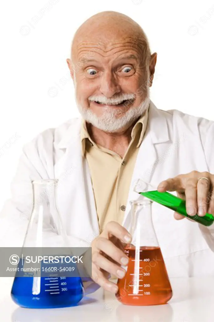 Scientist pouring chemicals