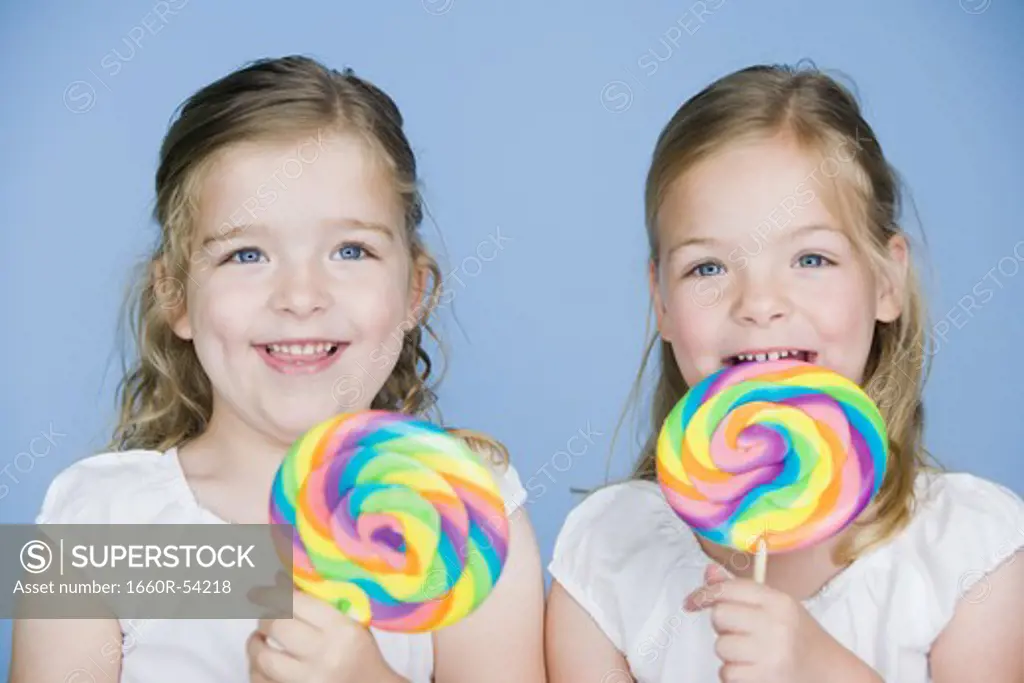 Girls with lollipops