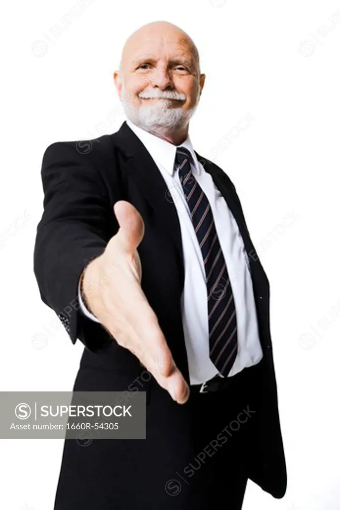 Portrait of businessman with outstretched hand