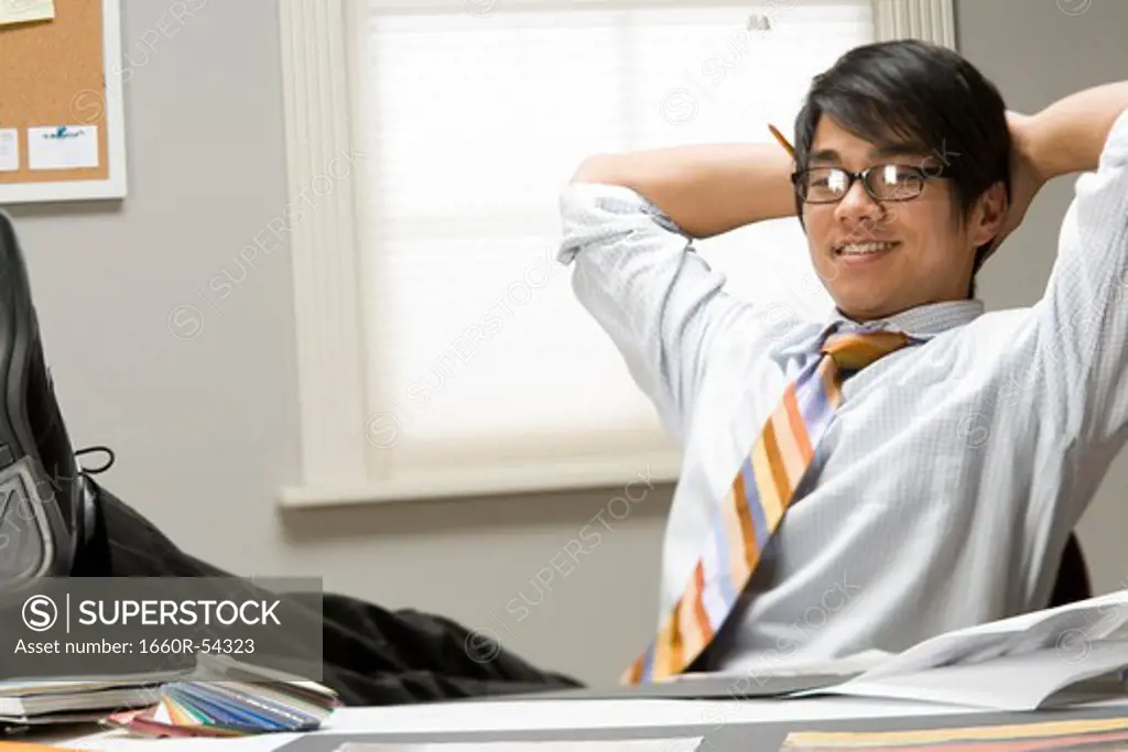 Man in office smiling