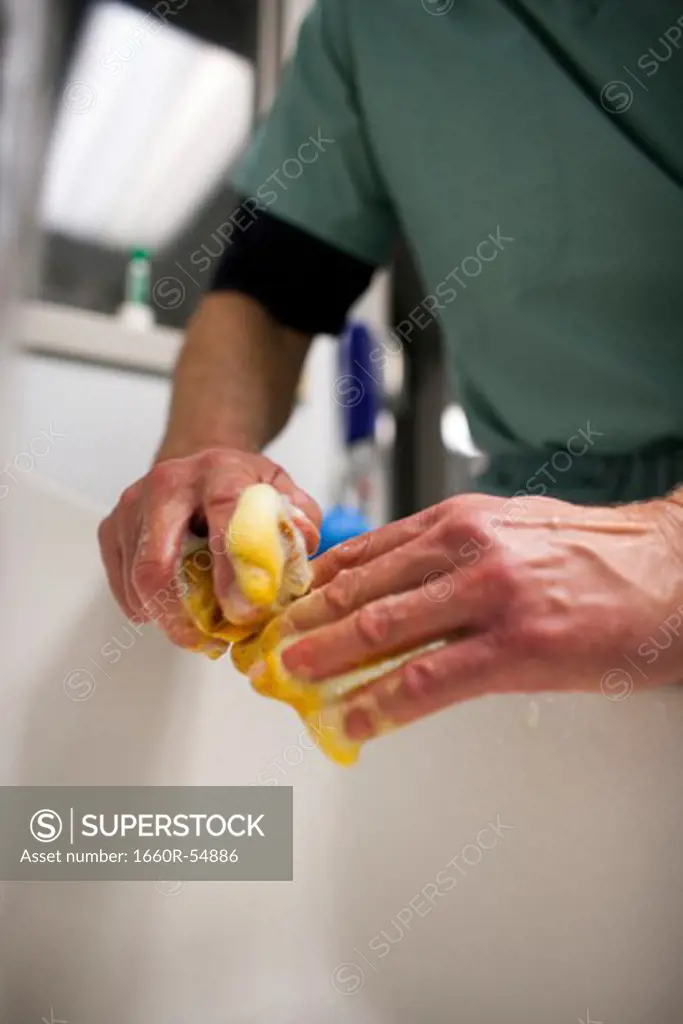 Surgeon washing his hands