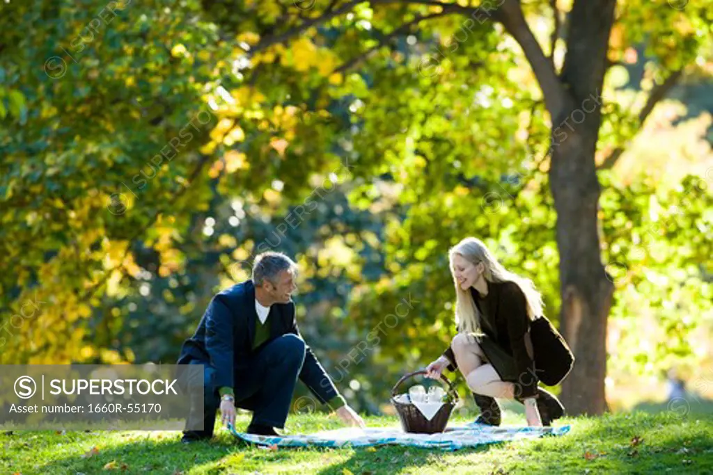 Couple with picnic outdoors