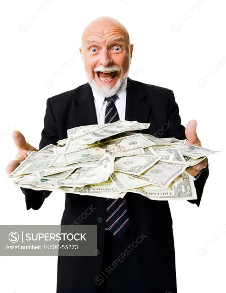 Excited mature man with large sum of money
