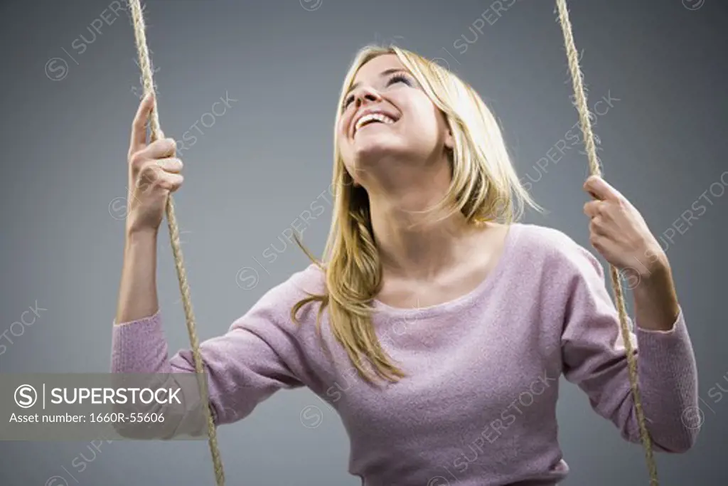 Woman on swing smiling