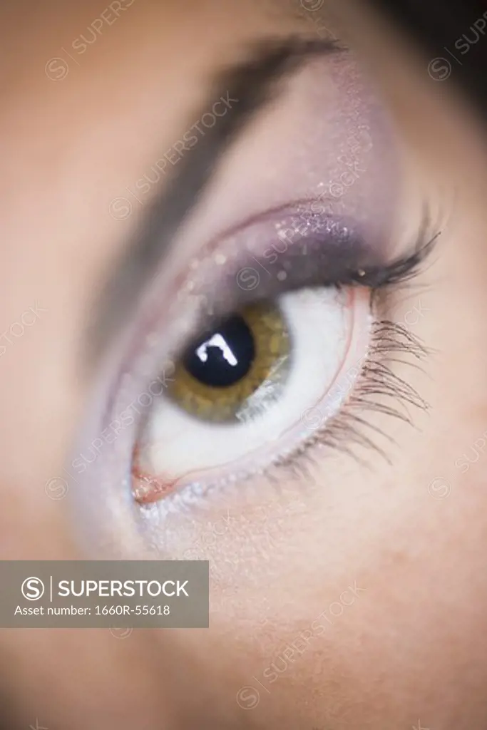 Closeup of closed female eye with eyelashes