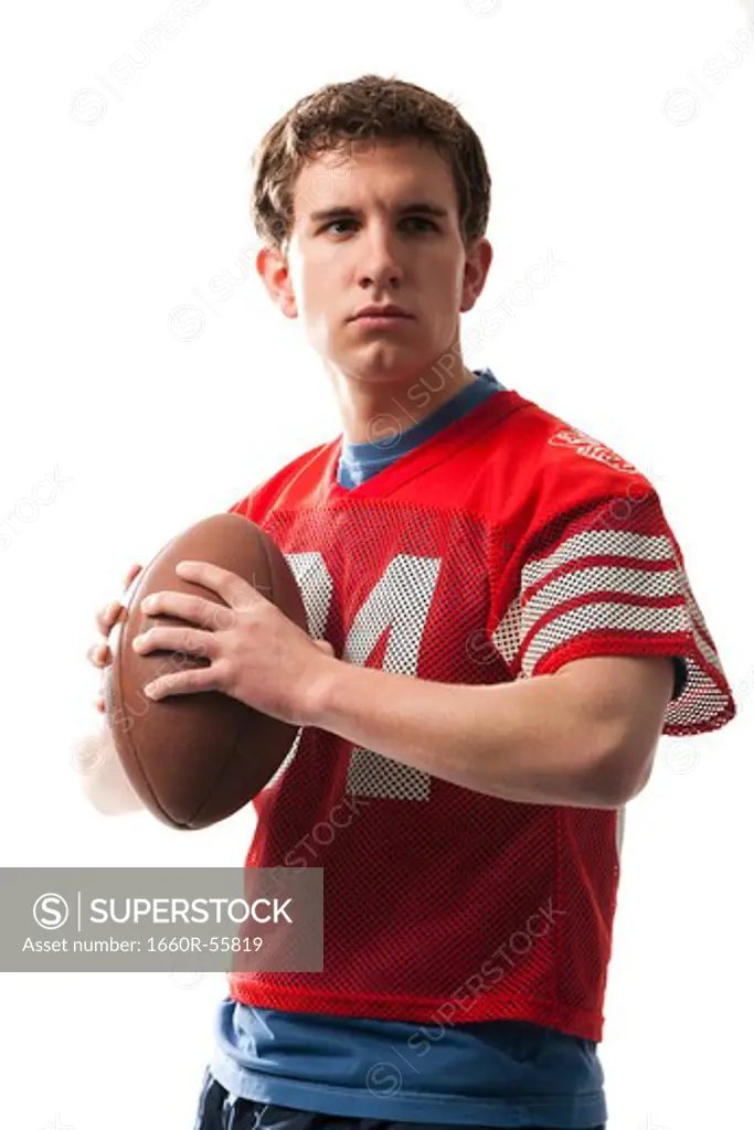 Man standing with football