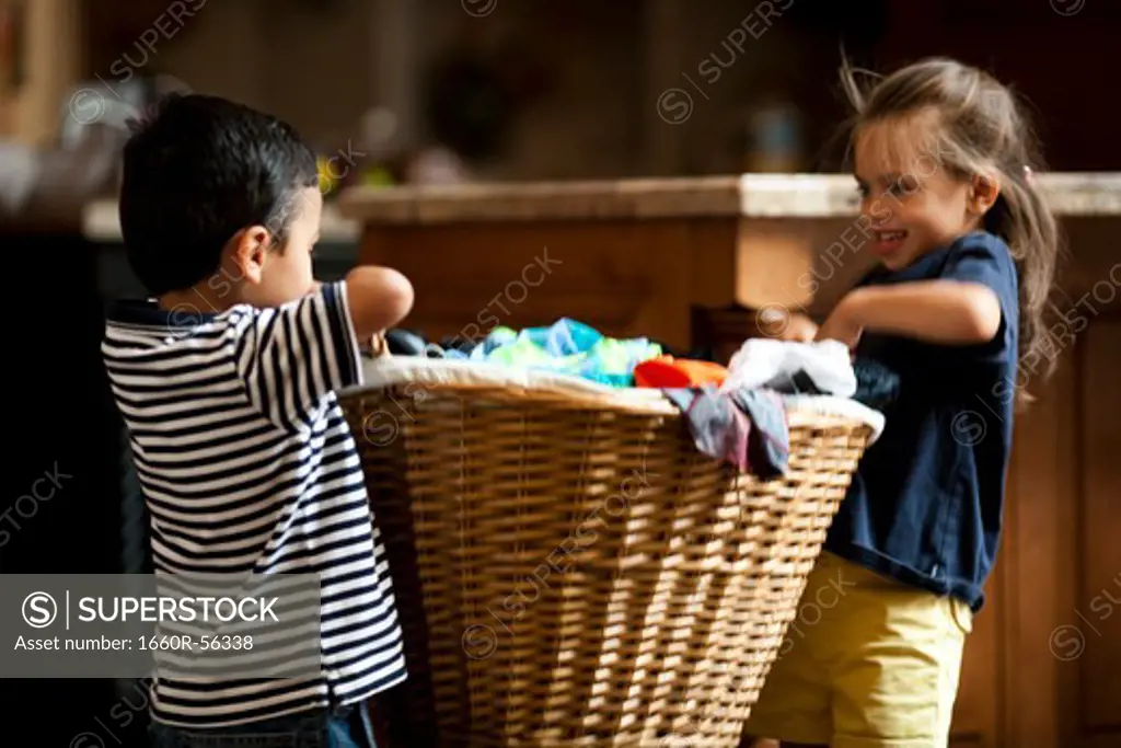 Young girl with laundry basket