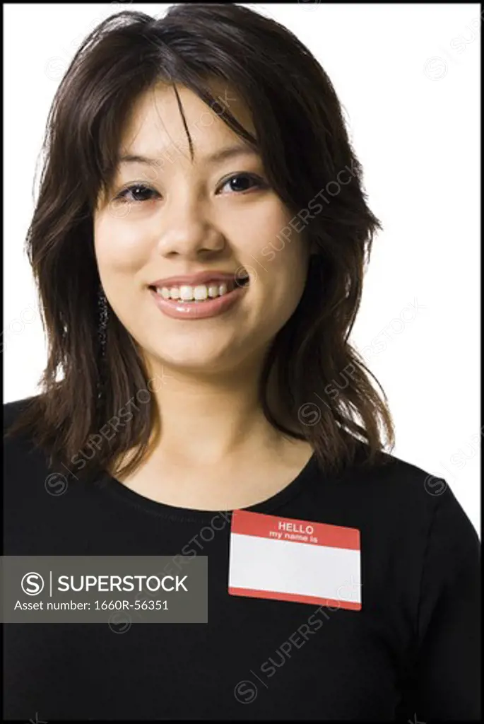 Portrait of a woman with blank name tag