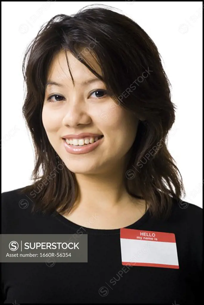 Portrait of a woman with blank name tag