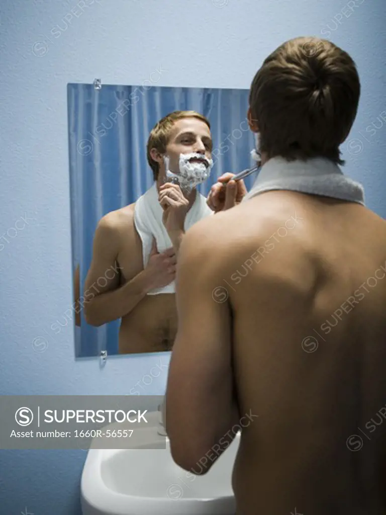 Male grooming himself
