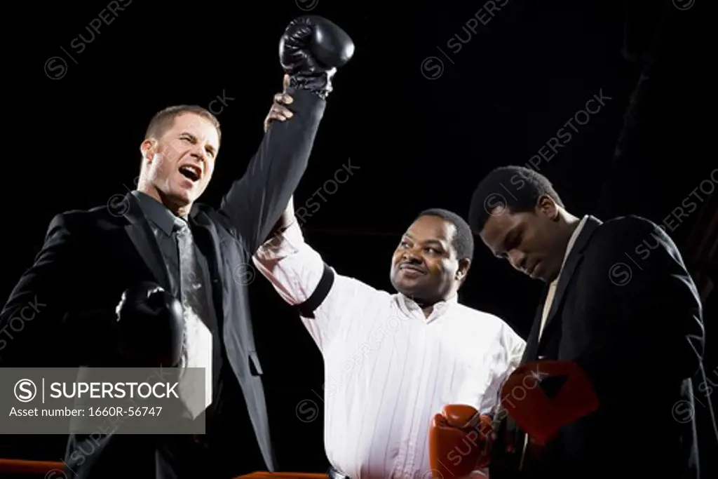 Businessmen boxing