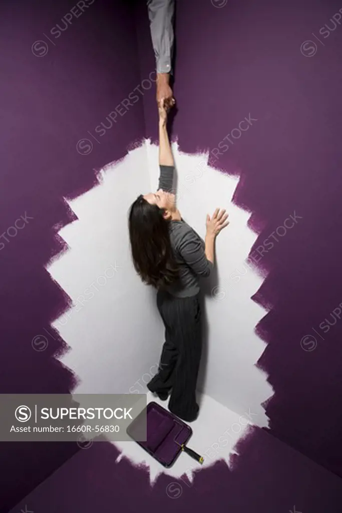 Woman reaching for a helping hand