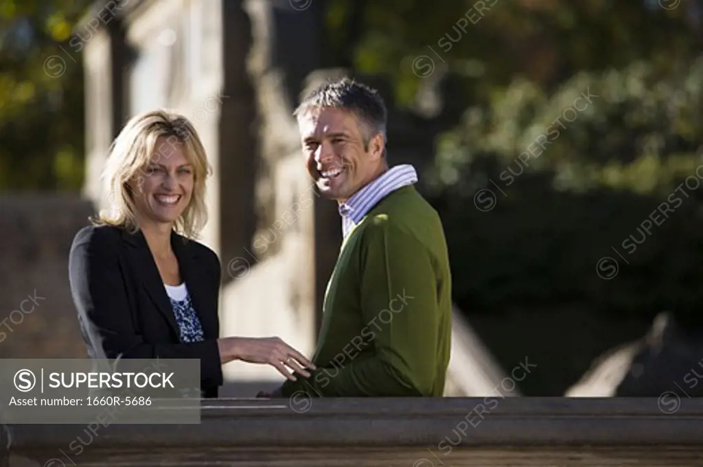 Portrait of a woman and man smiling