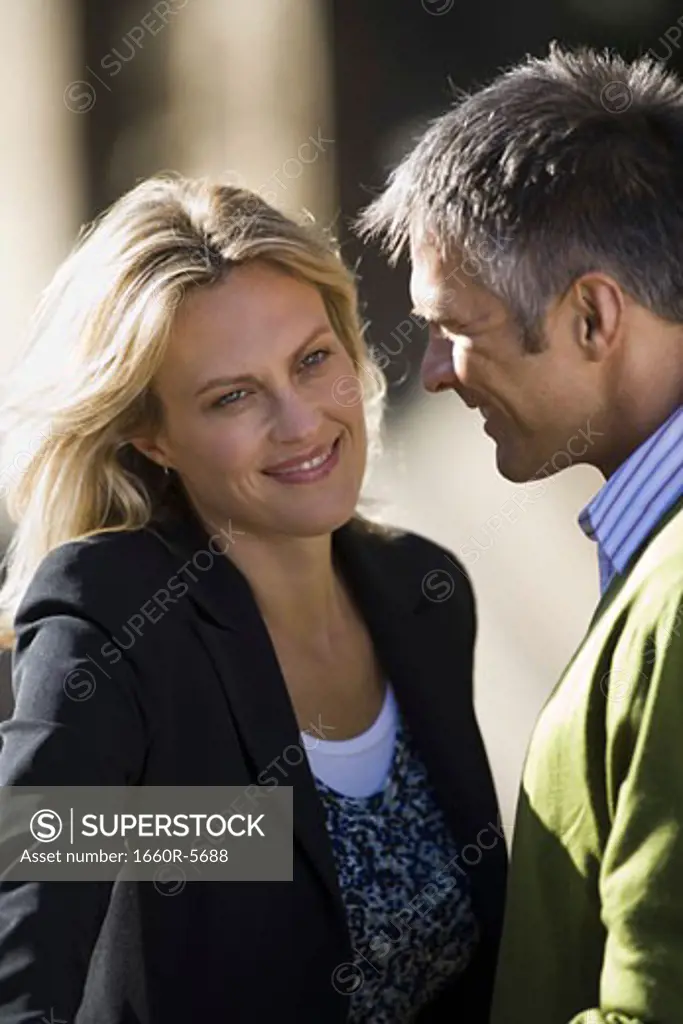 Woman and man smiling