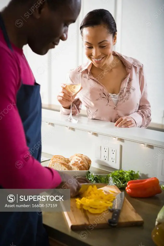 A couple preparing food