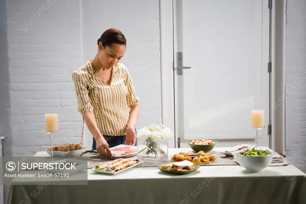 A woman preparing a party